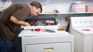 A major appliance repair in progress